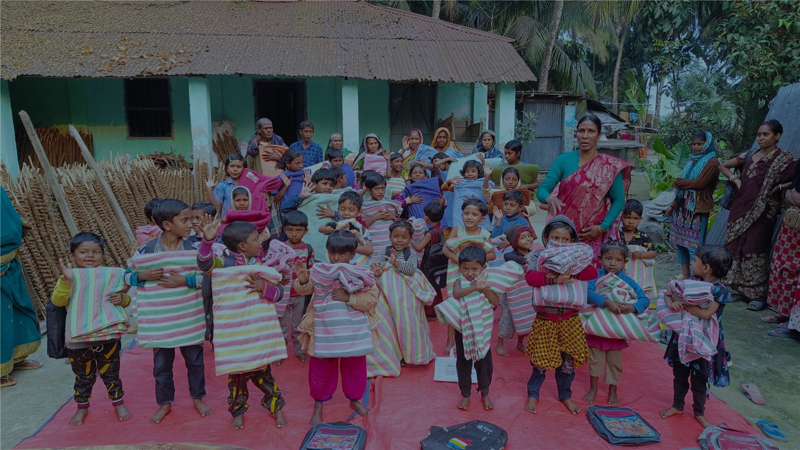 Blanket distribution to families in Bangladesh