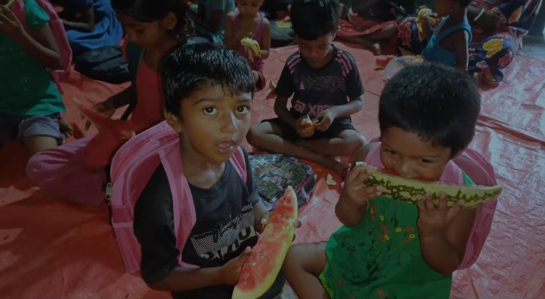 Children receiving meals in Bangladesh